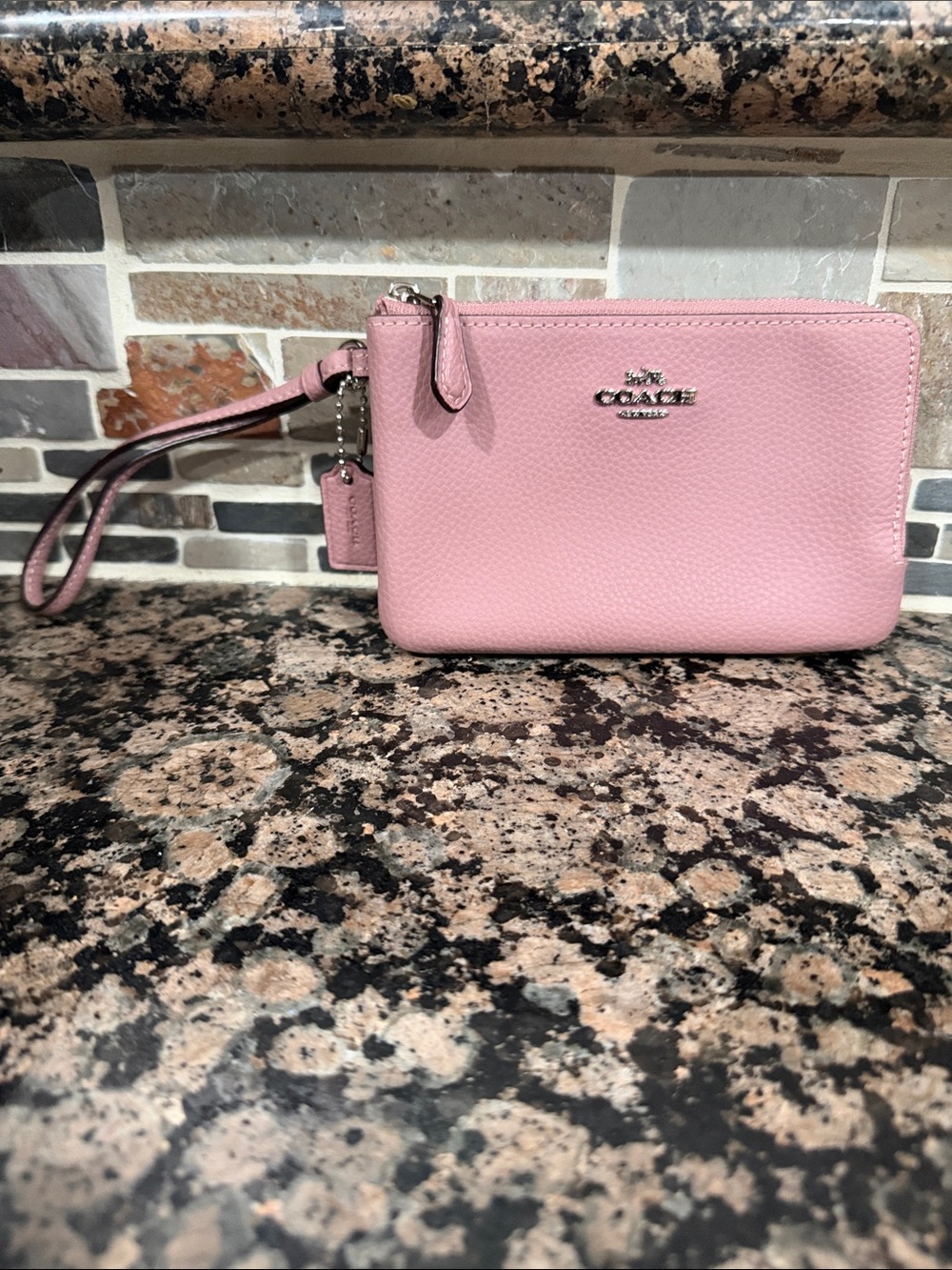 Coach Pinkish purplish Pebbled Leather Wristlet